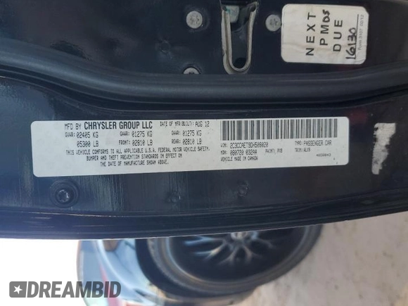 2013 Chrysler 300 C with VIN 2C3CCAET9DH508020, listed as a Copart auction lot 54923575 with 106,469 mi miles and Salvage Title. Bid and sale history available at DreamBid. Image 13.