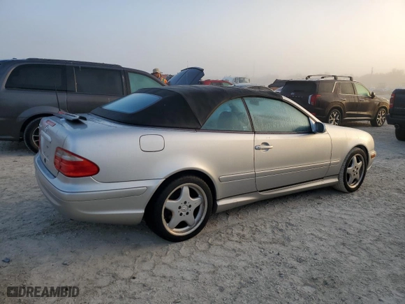 2000 Mercedes-Benz CLK-Class with VIN WDBLK70G3YT028400, listed as a Copart auction lot 77657964 with 0 mi miles and Salvage Title. Bid and sale history available at carsss.com. Image 3.