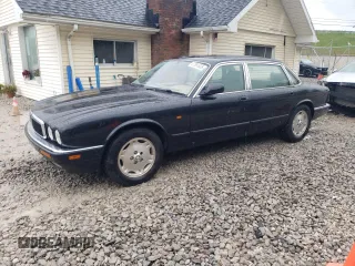 1997 Jaguar XJ with VIN SAJHX6248VC806189, listed as a Copart auction lot 57891035 with 51,654 mi miles and Salvage title. Bid and sale history available at DreamBid. Image 1.