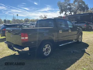 2005 Ford F-150 XLT with VIN 1FTPW12575KE12987, listed as a Copart auction lot 48539135 with 217,115 mi miles and Salvage Title. Bid and sale history available at carsss.com. Image 4.