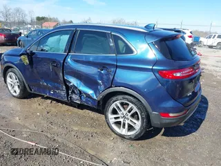 2015 Lincoln MKC with VIN 5LMTJ2AH2FUJ12531, listed as a IAAI auction lot 41639903 with 112,835 mi miles. Bid and sale history available at carsss.com. Image 3.