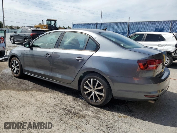 2016 Volkswagen Jetta Sedan 1.4T SE with VIN 3VWD67AJ9GM256092, listed as a Copart auction lot 52818165 with 103,286 mi miles and Salvage Title. Bid and sale history available at carsss.com. Image 2.