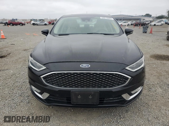 2017 Ford Fusion Titanium z VIN 3FA6P0SU5HR105415, wystawiony jako Copart lot #59779715 z przebiegiem 88 988 mil mil oraz Szkoda całkowita • Salvage title. Historia ofert i sprzedaży dostępna na DreamBid. Obrazek 5.