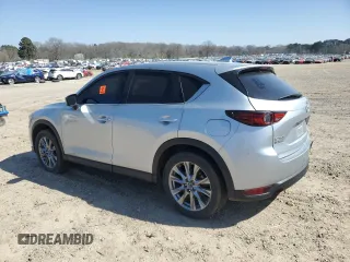 2021 Mazda CX-5 Grand Touring with VIN JM3KFADM6M0387094, listed as a Copart auction lot 48350845 with 94,701 mi miles and Salvage Title. Bid and sale history available at carsss.com. Image 2.