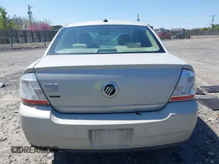 2008 Mercury Sable Premier z VIN 1MEHM42W28G613576, wystawiony jako IAAI lot #41900783 z przebiegiem 176 028 mil mil oraz . Historia ofert i sprzedaży dostępna na DreamBid. Obrazek 16.