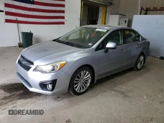 2012 Subaru Impreza Limited with VIN JF1GJAH65CH025580, listed as a Copart auction lot 56727645 with 103,452 mi miles and Salvage title. Bid and sale history available at DreamBid. Image 1.
