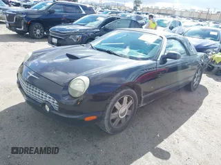 2004 Ford Thunderbird Deluxe with VIN 1FAHP60A64Y101843, listed as a IAAI auction lot 41582696 with 146,492 mi miles and . Bid and sale history available at DreamBid. Image 2.