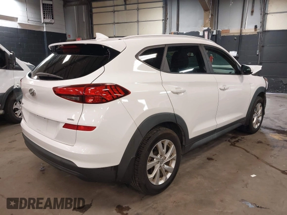 2019 Hyundai Tucson Value z VIN KM8J3CA47KU874061, wystawiony jako IAAI lot #41908116 z przebiegiem 60 754 mil mil oraz . Historia ofert i sprzedaży dostępna na DreamBid. Obrazek 4.