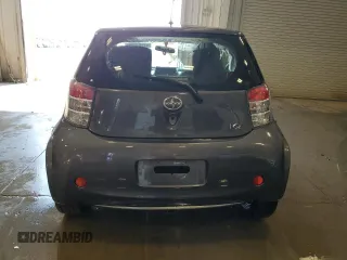 2012 Scion iQ with VIN JTNJJXB07CJ018013, listed as a Copart auction lot 57101085 with 91,370 mi miles and Non repairable. Bid and sale history available at DreamBid. Image 6.