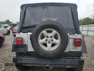 2004 Jeep Wrangler X with VIN 1J4FA39S24P714961, listed as a Copart auction lot 57871235 with 123,164 mi miles and Clean title. Bid and sale history available at DreamBid. Image 6.