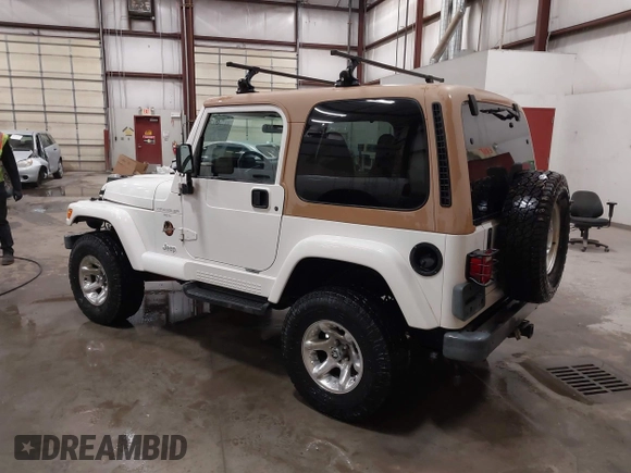 1997 Jeep Wrangler Sahara with VIN 1J4FY49S3VP529837, listed as a IAAI auction lot 41752978 with 138,024 mi miles. Bid and sale history available at carsss.com. Image 3.