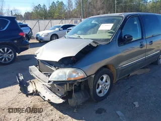 2003 Ford Windstar SE with VIN 2FMZA52473BB65706, listed as a IAAI auction lot 41300897 with 160,965 mi miles and . Bid and sale history available at DreamBid. Image 13.