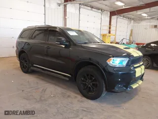2014 Dodge Durango Limited with VIN 1C4RDJDG3EC585803, listed as a IAAI auction lot 42049378 with 180,722 mi miles. Bid and sale history available at carsss.com. Image 1.