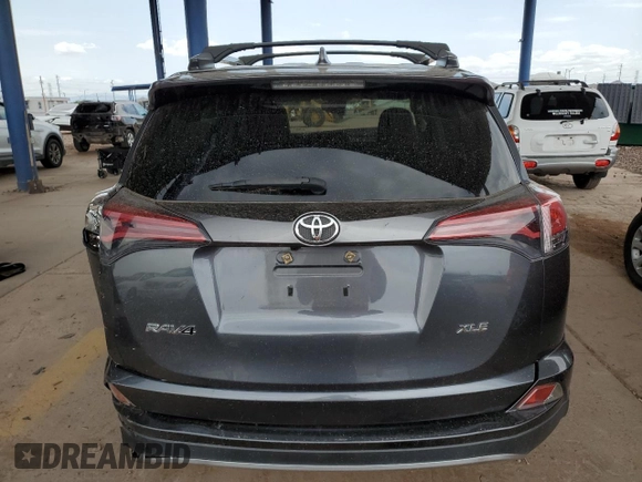 2018 Toyota RAV4 XLE with VIN JTMWFREV9JD131259, listed as a Copart auction lot 64748645 with 93,116 mi miles and Salvage title. Bid and sale history available at DreamBid. Image 6.