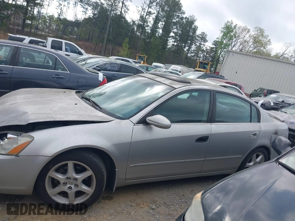 2002 Nissan Altima SE with VIN 1N4BL11D22C276694, listed as a IAAI auction lot 41949577 with 170,000 mi miles. Bid and sale history available at carsss.com. Image 14.