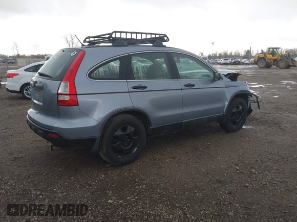 2009 Honda CR-V LX with VIN 5J6RE48339L016522, listed as a IAAI auction lot 40783609 with 209,891 mi miles. Bid and sale history available at carsss.com. Image 4.