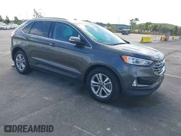 2020 Ford Edge SEL with VIN 2FMPK4J90LBA60985, listed as a IAAI auction lot 41590512 with 141,733 mi miles. Bid and sale history available at carsss.com. Image 1.