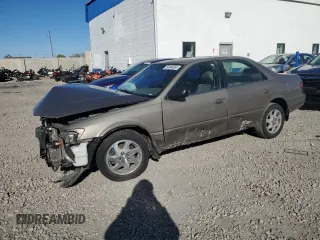 1999 Toyota Camry LE z VIN JT2BF28K0X0192130, wystawiony jako Copart lot #54446694 z przebiegiem Nie podano mil oraz Szkoda całkowita • Salvage title. Historia ofert i sprzedaży dostępna na DreamBid. Obrazek 1.