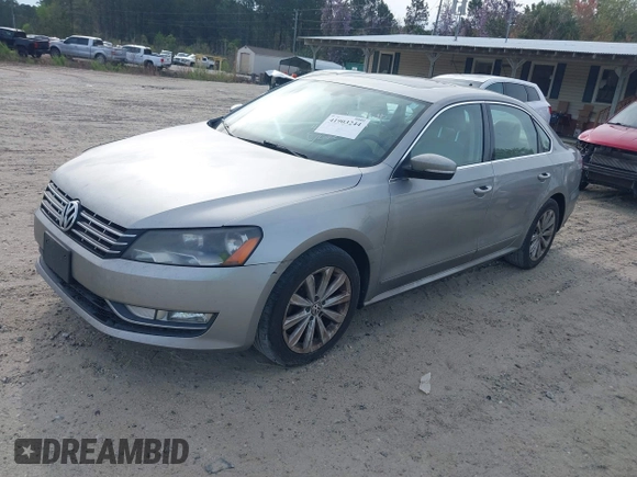 2013 Volkswagen Passat SEL Premium z VIN 1VWCP7A39DC045689, wystawiony jako IAAI lot #41903244 z przebiegiem 199 385 mil mil oraz . Historia ofert i sprzedaży dostępna na DreamBid. Obrazek 2.