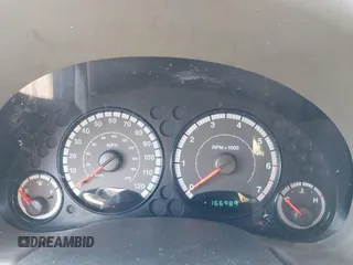 2005 Jeep Liberty Sport with VIN 1J4GL48K85W700799, listed as a IAAI auction lot 42054433 with 166,989 mi miles. Bid and sale history available at carsss.com. Image 7.