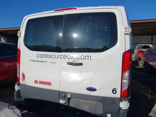 2018 Ford Transit with VIN 1FTYR1ZM6JKA89034, listed as a IAAI auction lot 41727541 with 219,080 mi miles and . Bid and sale history available at carsss.com. Image 16.