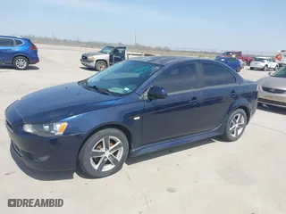 2013 Mitsubishi Lancer SE with VIN JA32V2FW4DU002980, listed as a IAAI auction lot 41803574 with 195,940 mi miles. Bid and sale history available at carsss.com. Image 2.
