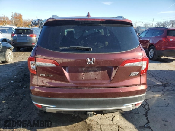 2020 Honda Pilot Touring 7-Passenger z VIN 5FNYF6H63LB004207, wystawiony jako Copart lot #81986794 z przebiegiem 98 454 mil mil oraz Szkoda całkowita • Salvage title. Historia ofert i sprzedaży dostępna na DreamBid. Obrazek 6.