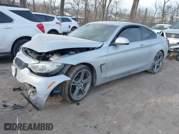 2015 BMW 4 Series 428i xDrive with VIN WBA3N9C53FK247985, listed as a IAAI auction lot 41395534 with 76,856 mi miles and . Bid and sale history available at DreamBid. Image 2.
