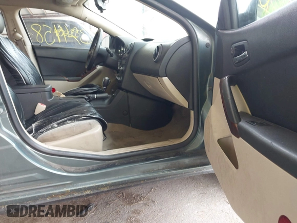 2009 Pontiac G6 1SA with VIN 1G2ZG57B694157985, listed as a IAAI auction lot 42374458 with 202,323 mi miles and . Bid and sale history available at DreamBid. Image 5.