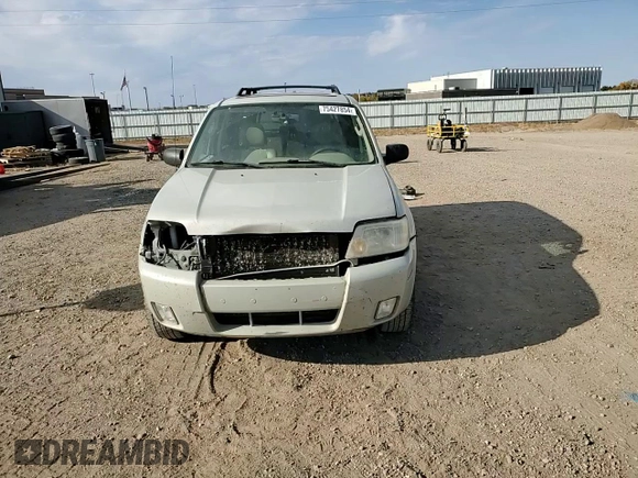2007 Mercury Mariner Luxury с VIN 4M2CU91157KJ03937, выставлен на аукционе Copart как лот 75427854 с пробегом 141 784 миль миль и На запчасти • Non repairable. История ставок и продаж доступна на DreamBid. Изображение 12.