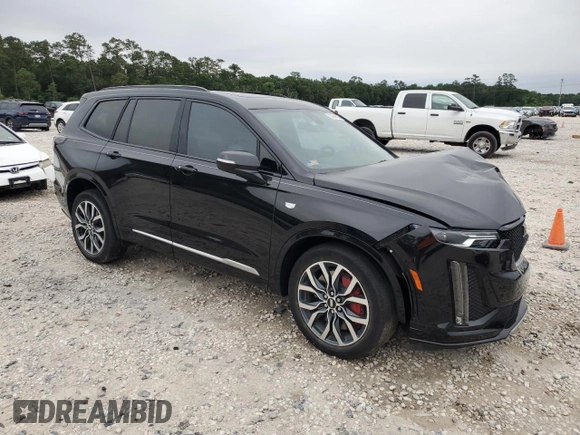 2023 Cadillac XT6 AWD Sport z VIN 1GYKPGRS6PZ126039, wystawiony jako Copart lot #55948605 z przebiegiem 39 966 mil mil oraz Szkoda całkowita • Salvage title. Historia ofert i sprzedaży dostępna na DreamBid. Obrazek 4.