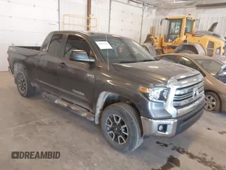 2016 Toyota Tundra SR z VIN 5TFUW5F11GX517807, wystawiony jako IAAI lot #42047485 z przebiegiem 271 586 mil mil oraz . Historia ofert i sprzedaży dostępna na DreamBid. Obrazek 1.