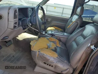 1997 GMC Suburban z VIN 1GKFK16R6VJ758513, wystawiony jako Copart lot #75034574 z przebiegiem 181 873 mil mil oraz Szkody całkowita. Historia ofert i sprzedaży dostępna na DreamBid. Obrazek 7.