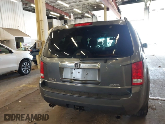 2011 Honda Pilot EX-L with VIN 5FNYF4H65BB020721, listed as a IAAI auction lot 41794436 with 113,630 mi miles and . Bid and sale history available at carsss.com. Image 16.