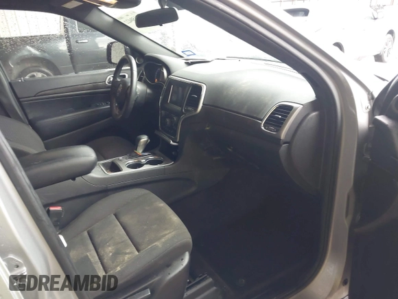 2018 Jeep Grand Cherokee Laredo E with VIN 1C4RJEAG1JC275356, listed as a IAAI auction lot 42150422 with 69,720 mi miles and . Bid and sale history available at DreamBid. Image 5.