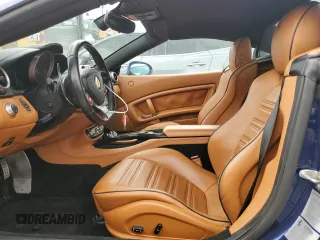 2013 Ferrari California z VIN ZFF65THA9D0194738, wystawiony jako Copart lot #77637104 z przebiegiem 28 670 mil mil oraz Nie do naprawy. Historia ofert i sprzedaży dostępna na DreamBid. Obrazek 7.