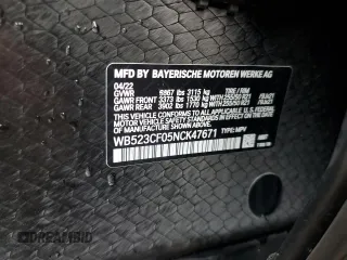 2022 BMW iX xDrive50 z VIN WB523CF05NCK47671, wystawiony jako Copart lot #69265573 z przebiegiem 13 090 mil mil oraz . Historia ofert i sprzedaży dostępna na DreamBid. Obrazek 14.