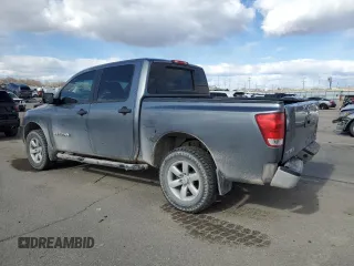 2015 Nissan Titan S with VIN 1N6AA0EJ3FN510726, listed as a Copart auction lot 49735805 with 111,032 mi miles and Salvage title. Bid and sale history available at DreamBid. Image 2.