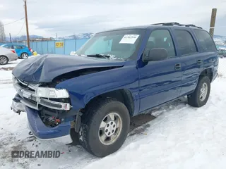2002 Chevrolet Tahoe LS with VIN 1GNEK13V12J330179, listed as a IAAI auction lot 41382530 with 216,051 mi miles and . Bid and sale history available at DreamBid. Image 2.