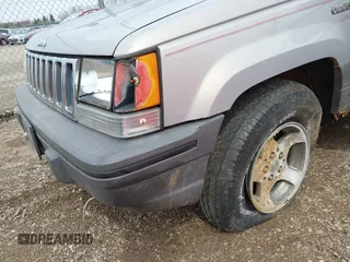 1995 Jeep Grand Cherokee Laredo with VIN 1J4GZ58S4SC532578, listed as a IAAI auction lot 41936041 with 161,777 mi miles. Bid and sale history available at carsss.com. Image 6.
