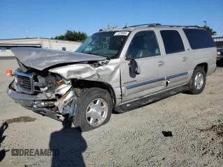2004 GMC Yukon XL SLT with VIN 1GKEC16T44J308569, listed as a Copart auction lot 71376884 with 0 mi miles and Salvage Title. Bid and sale history available at carsss.com. Image 1.