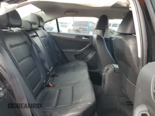 2013 Volkswagen Jetta TDI w/Premium с VIN 3VWLL7AJ9DM434549, выставлен на аукционе Copart как лот 52404455 с пробегом 91 233 миль миль и Списание • Salvage title. История ставок и продаж доступна на DreamBid. Изображение 11.