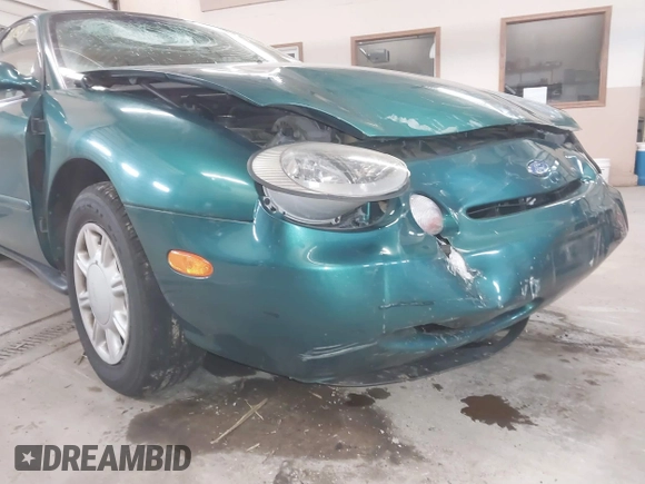 1996 Ford Taurus GL z VIN 1FALP52U5TG110582, wystawiony jako IAAI lot #40858639 z przebiegiem 57 965 mil mil oraz . Historia ofert i sprzedaży dostępna na DreamBid. Obrazek 6.