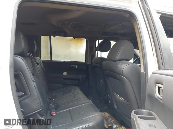 2014 Honda Pilot Touring z VIN 5FNYF4H93EB022045, wystawiony jako IAAI lot #42060815 z przebiegiem Nie podano mil oraz . Historia ofert i sprzedaży dostępna na DreamBid. Obrazek 8.