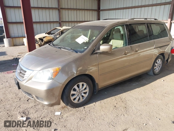 2010 Honda Odyssey EX-L with VIN 5FNRL3H79AB048049, listed as a IAAI auction lot 42055090 with 142,736 mi miles. Bid and sale history available at carsss.com. Image 17.