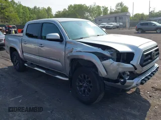 2022 Toyota Tacoma SR with VIN 3TYCZ5AN2NT092683, listed as a IAAI auction lot 42411149 with 58,317 mi miles and . Bid and sale history available at DreamBid. Image 1.