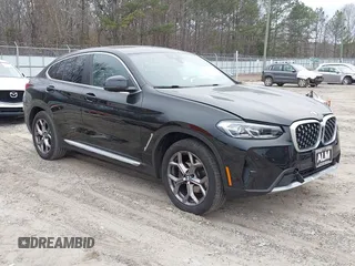 2023 BMW X4 xDrive30i with VIN 5UX33DT01P9S20808, listed as a IAAI auction lot 41153530 with 33,008 mi miles. Bid and sale history available at carsss.com. Image 1.
