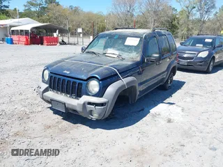 2004 Jeep Liberty Sport with VIN 1J4GL48K44W303606, listed as a IAAI auction lot 41895990 with 145,765 mi miles. Bid and sale history available at carsss.com. Image 2.
