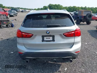 2018 BMW X1 xDrive28i with VIN WBXHT3C32J5K23486, listed as a IAAI auction lot 42387208 with 76,115 mi miles and . Bid and sale history available at DreamBid. Image 17.