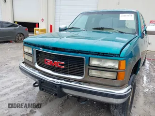 1994 GMC Sierra 1500 with VIN 2GDEK19K2R1549660, listed as a IAAI auction lot 41615642 with 207,399 mi miles and . Bid and sale history available at DreamBid. Image 6.